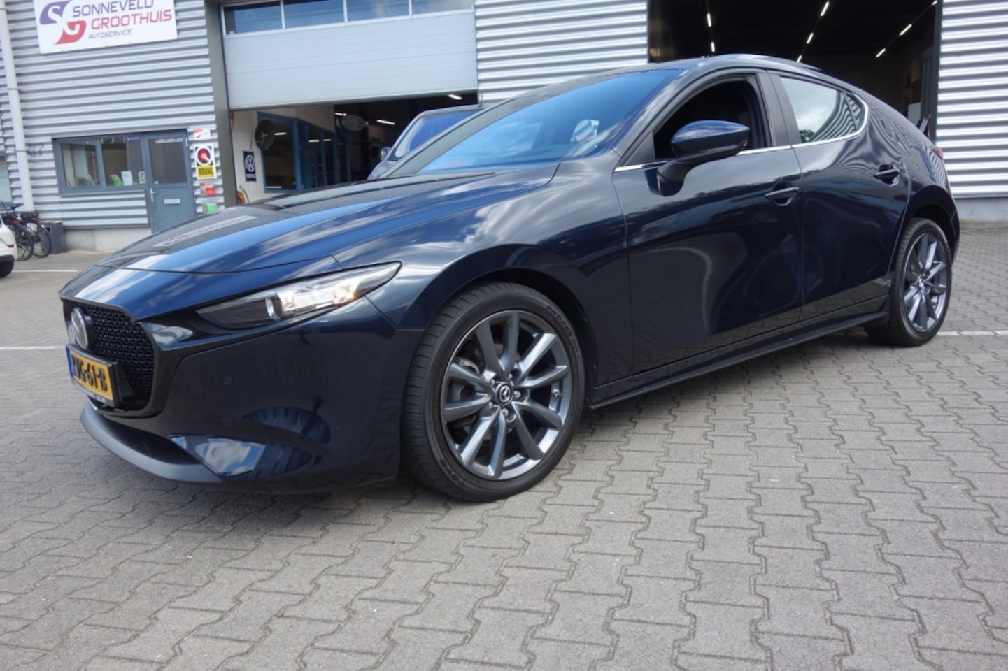 Mazda 3 - 2.0 E-SA-G COMFORT,18 Inch,Navi, HUD, i-Activesense - AutoWereld.nl