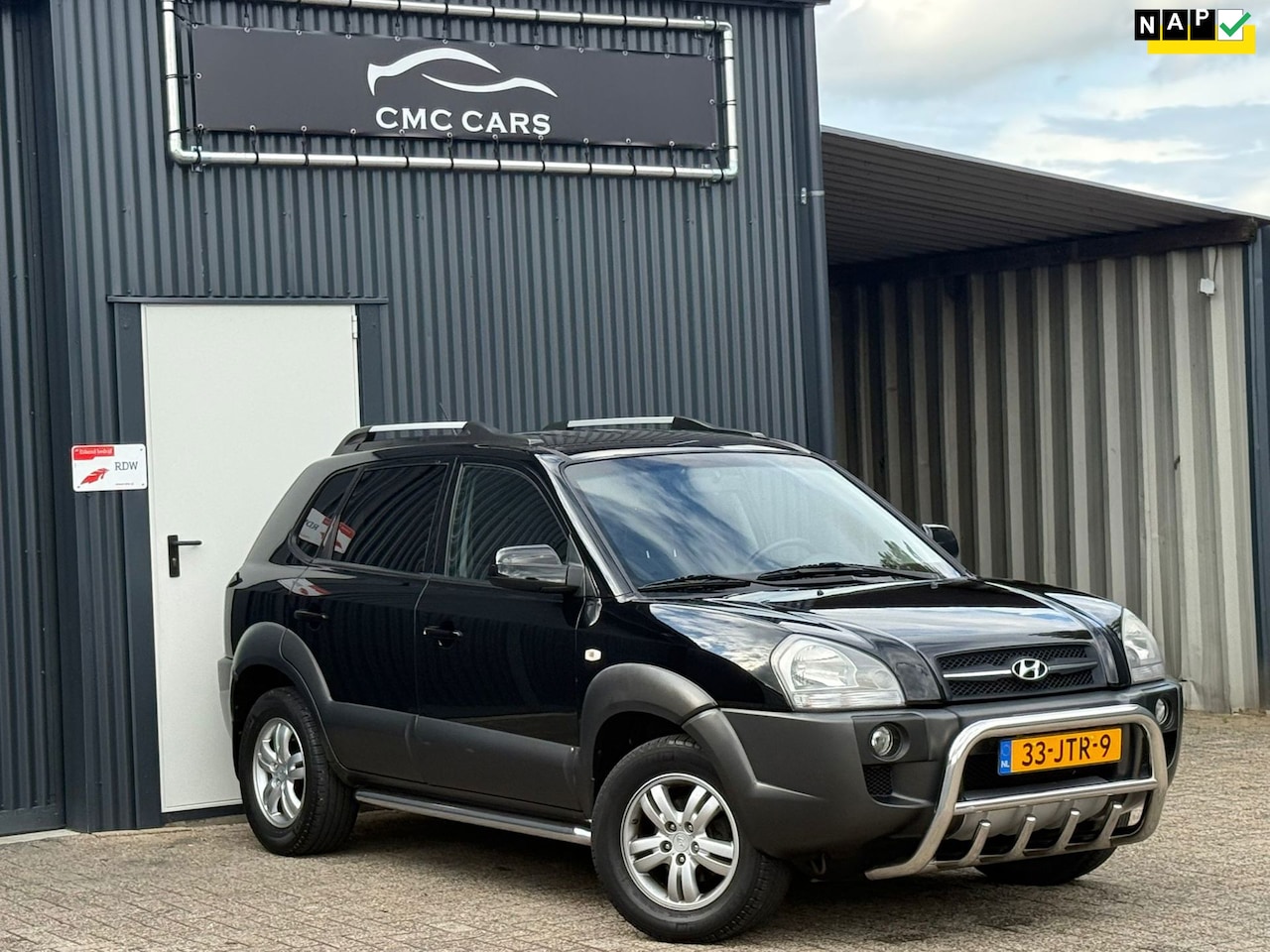 Hyundai Tucson - 2.0i Style Cross RIJDTPERFECT!!DRIEM VV!!NW APK!! - AutoWereld.nl