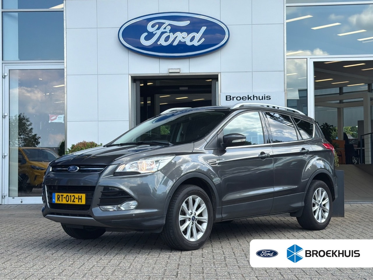Ford Kuga - 1.5 Titanium | Trekhaak | Dealer OH! | Cruise Control | Stoelverwarming | Navigatie | Acht - AutoWereld.nl