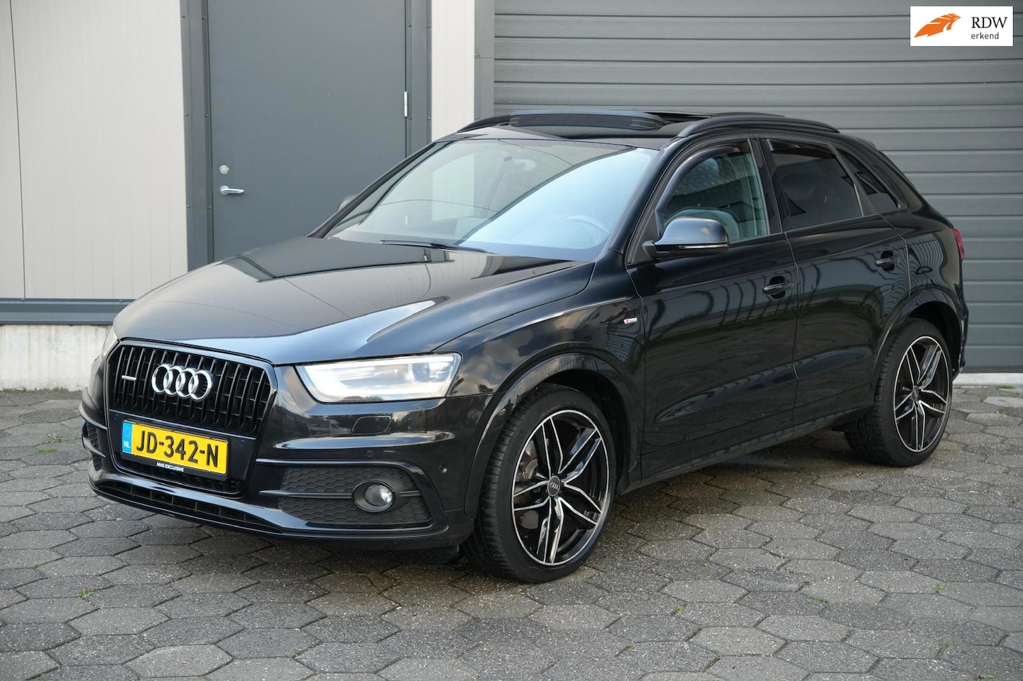 Audi Q3 - 2.0 TFSI Quattro Pro S-Line Panorama PDC Aut. - AutoWereld.nl