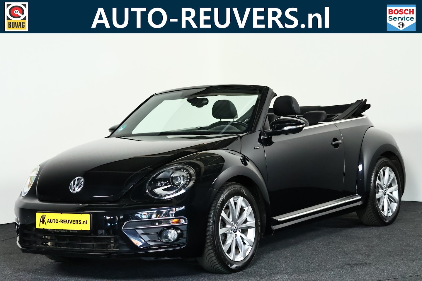 Volkswagen Beetle Cabriolet - 1.4 TSI Design BlueMotion Navi / Leder / Cruise / Fender / LMV / Xenon - AutoWereld.nl