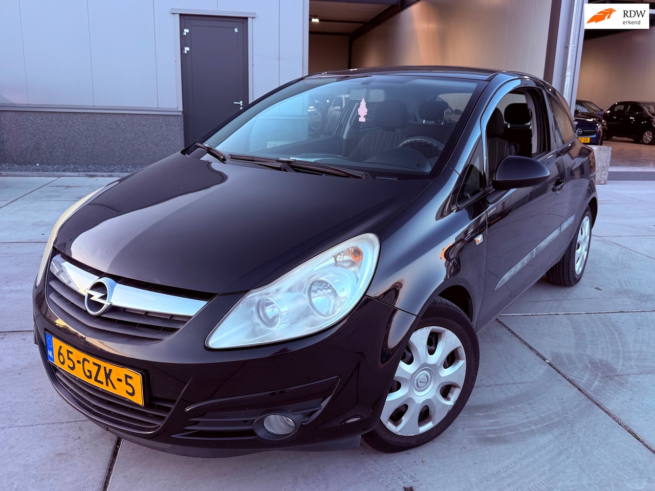 Opel Corsa - 1.4-16V Enjoy cruis airco - AutoWereld.nl