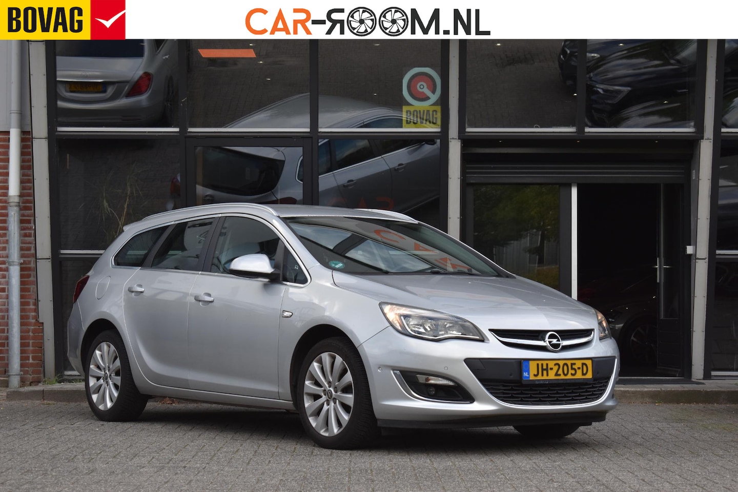 Opel Astra Sports Tourer - 1.4 Turbo Sport Camera Cruise - AutoWereld.nl