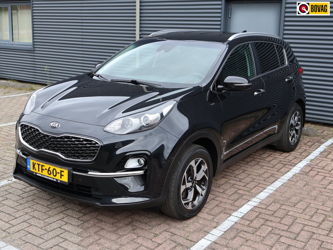 Kia Sportage - 1.6 T-GDI 4WD DynamicLine Camera Airco Cruise Apple Carplay Navi Garantie - AutoWereld.nl