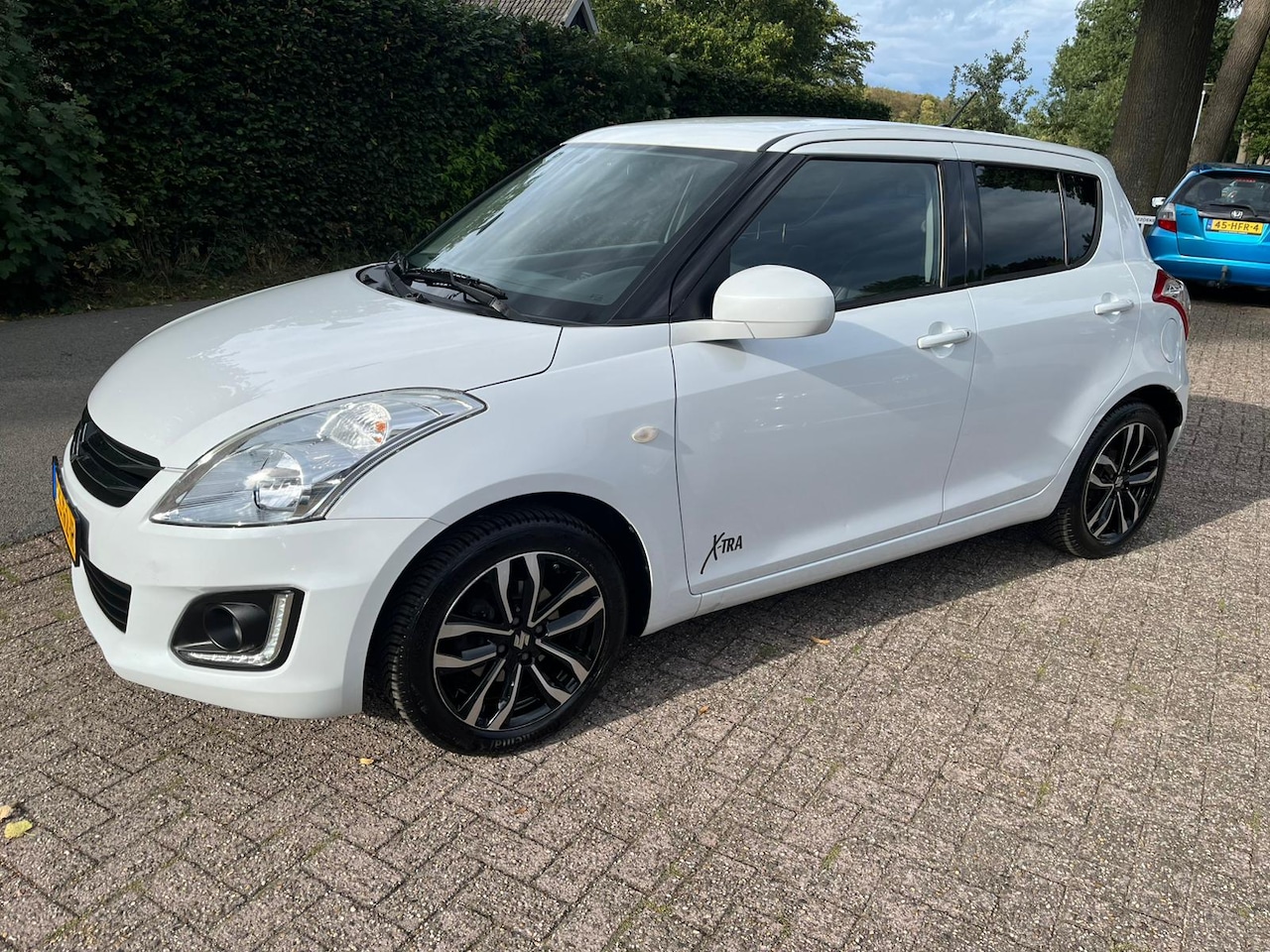 Suzuki Swift - 1.2 94pk 5d X-TRA - AutoWereld.nl