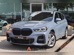 BMW X1 - (f48) sDrive18i M-Sport | Stormbay | LED | Navigatie | Cruise | Climate | Sfeerverlichting
