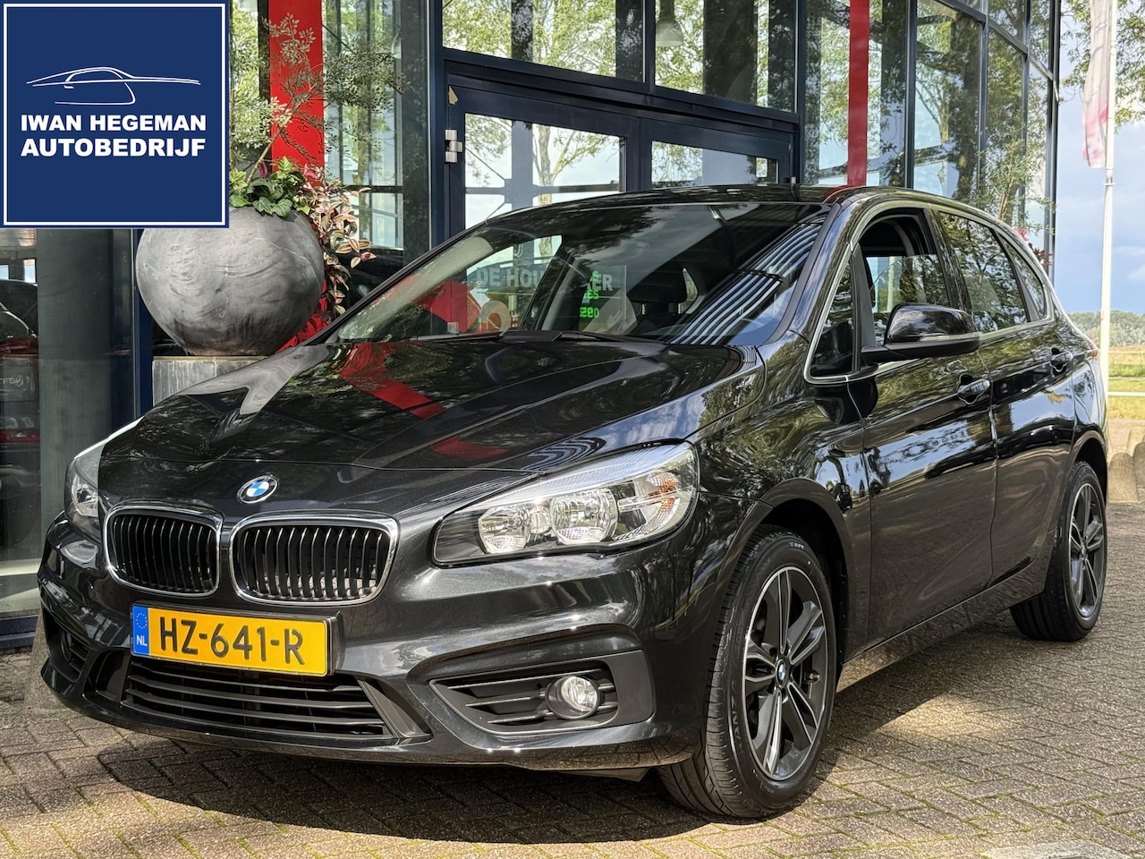 BMW 2-serie Active Tourer - 216i Essential | PDC | ECC | Navigatie | LM Velgen - AutoWereld.nl