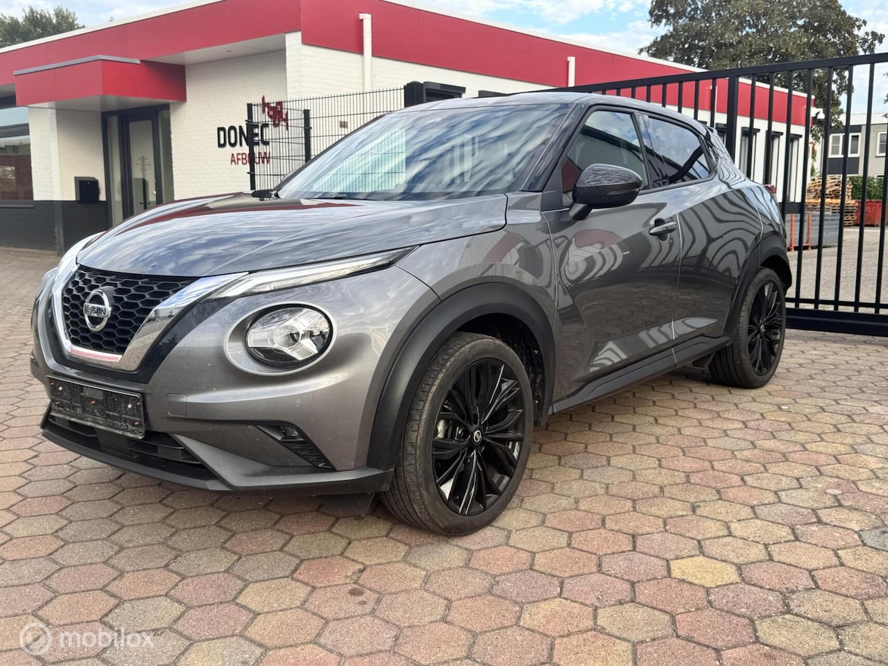 Nissan Juke - 1.0 DIG-T Enigma Automaat NAVI CAMERA CLIMA 19'' - AutoWereld.nl