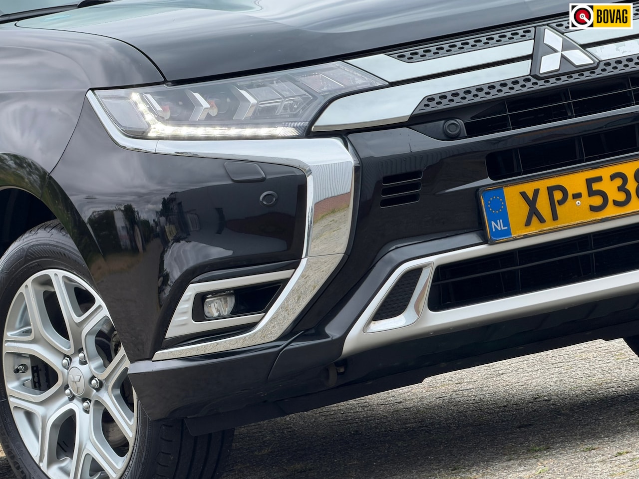 Mitsubishi Outlander - 2.4 PHEV Intense Plus - Black Pearl - Schuif/kantel dak - Leder - AutoWereld.nl