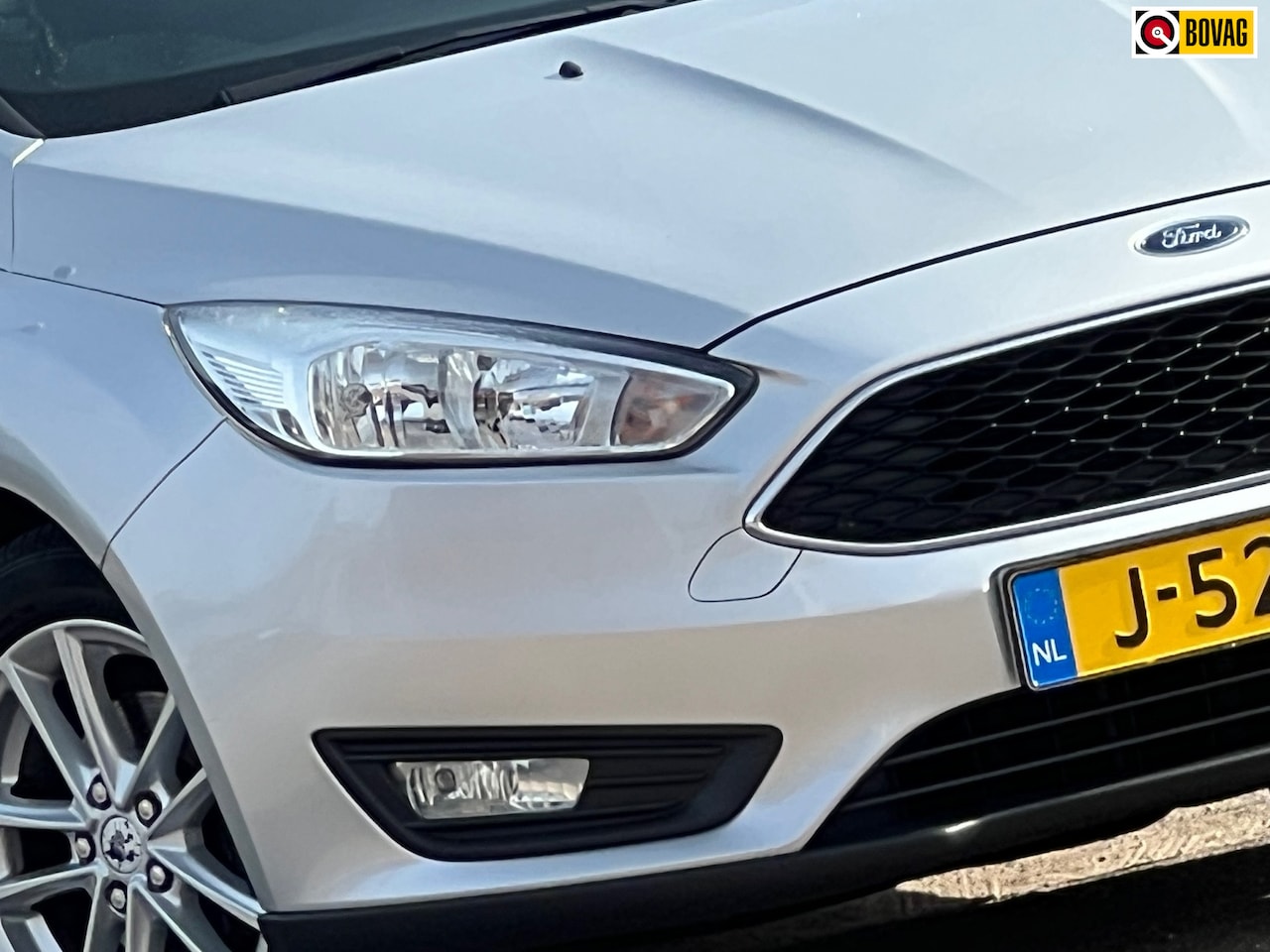 Ford Focus Wagon - 1.0 Titanium 125pk - Moondust Silver - Rijassistensystem/Cruise/Clima - AutoWereld.nl
