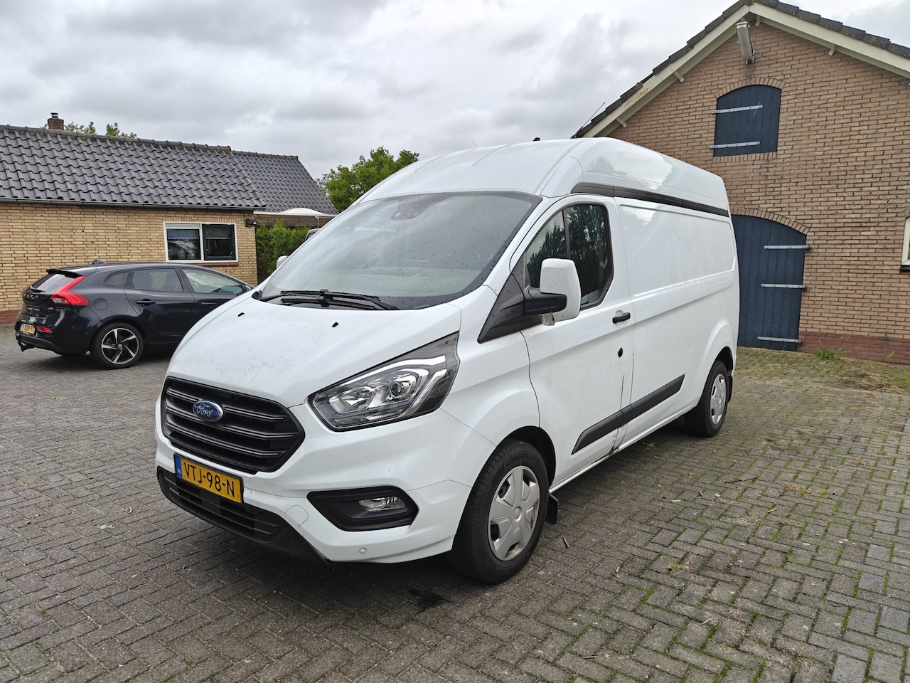 Ford Transit Custom - 340 2.0 TDCI L2H2 Trend AIRCO/NAVI BJ 2023 - AutoWereld.nl