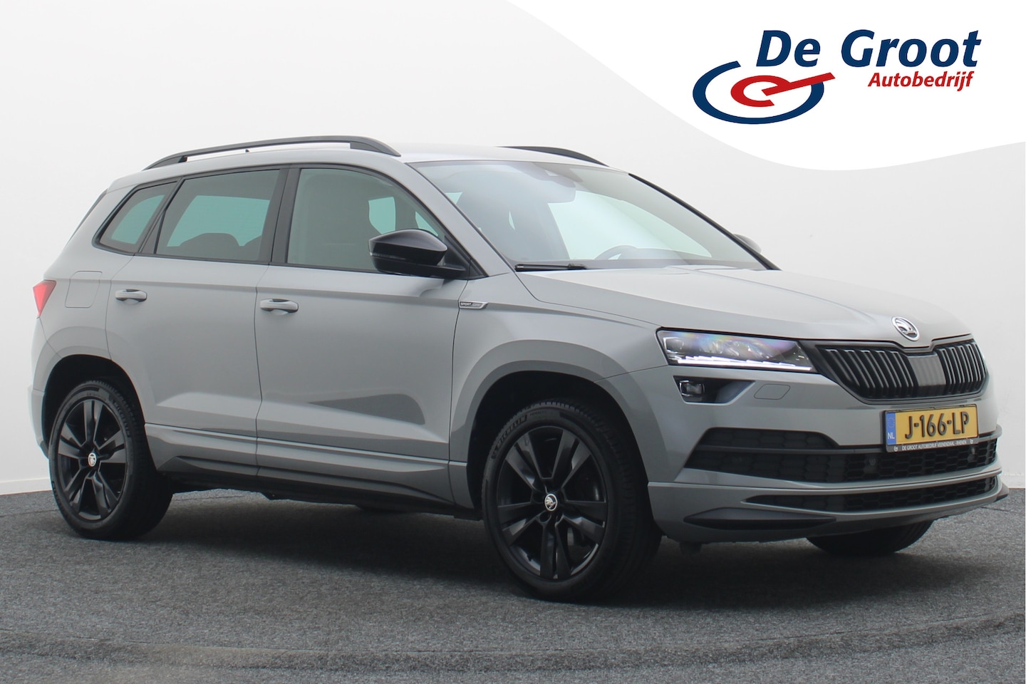 Skoda Karoq - 1.5 TSI ACT Sportline Business Camera, Virtual Cockpit, Trekhaak, Canton Sound, Keyless, P - AutoWereld.nl