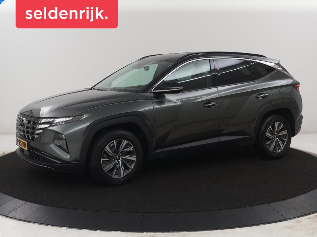 Hyundai Tucson - 1.6 T-GDI HEV Comfort Smart | Trekhaak | Adaptive cruise | Stuur/stoel verwarming | Climat - AutoWereld.nl