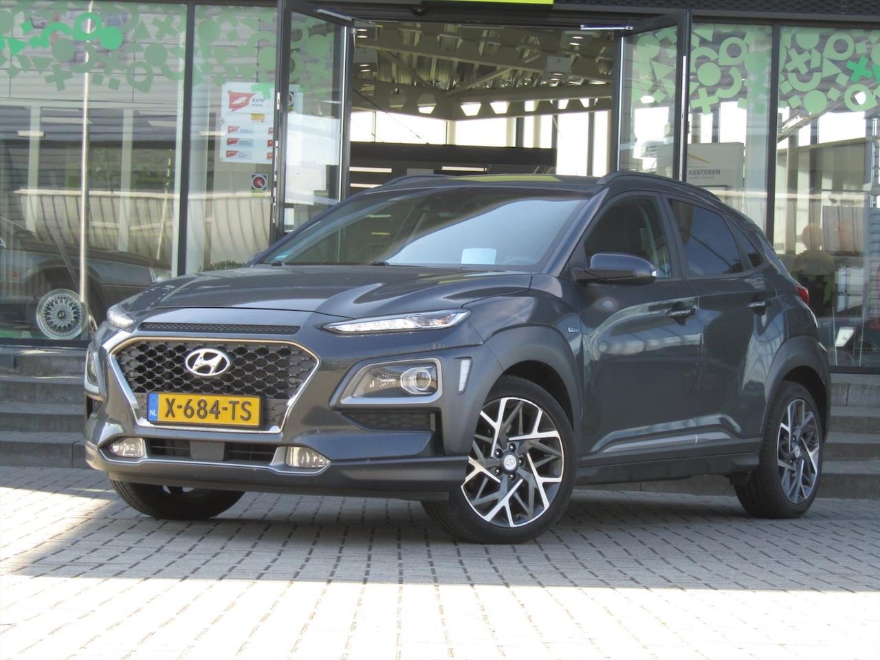 Hyundai Kona Electric - EV 204pk 2WD Aut. Premium / Navigatie / Camera / Leder / Stoelverwarming - Koeling / Blind - AutoWereld.nl