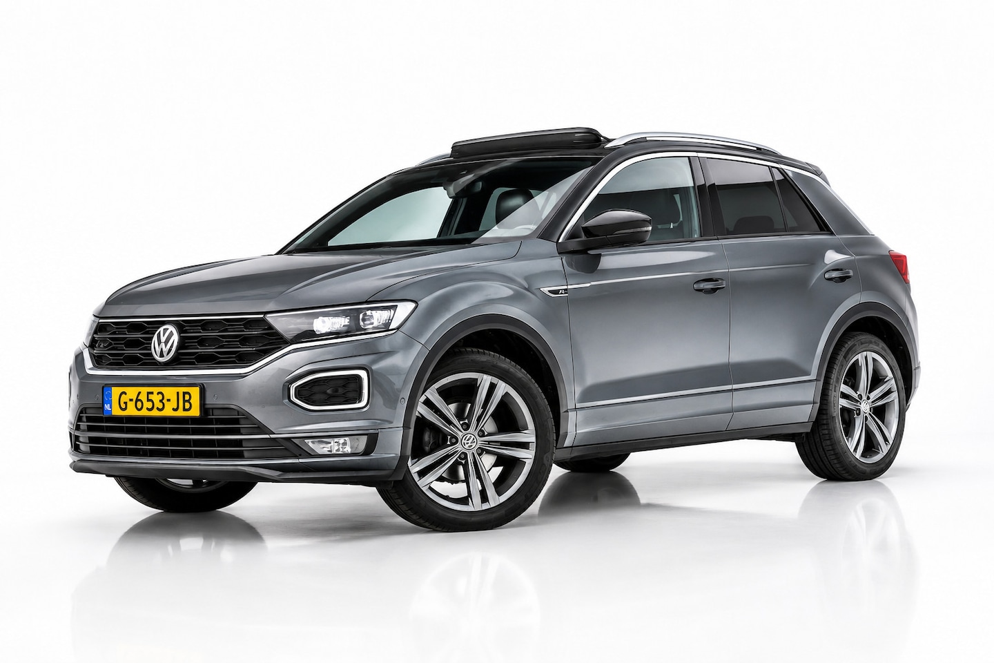 Volkswagen T-Roc - 1.5 TSI R-LINE | PANO | TREKHAAK | CAMERA | BEATS | NAP | ADAPT. CRUISE CONTROLE - AutoWereld.nl