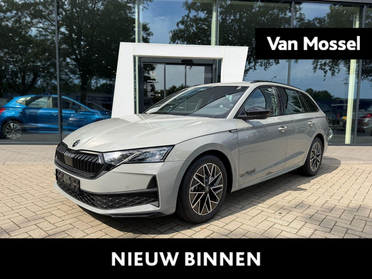 Skoda Octavia Combi - 1.5 TSI MHEV Sportline Business 150 PK | Automaat | Stoelverwarming | Parkeersensoren | Ad - AutoWereld.nl