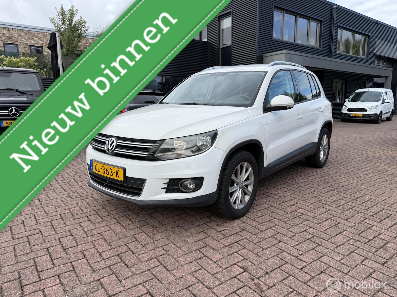 Volkswagen Tiguan - 2.0 TSI Sport&style Automaat Leder Nav Trekh - AutoWereld.nl