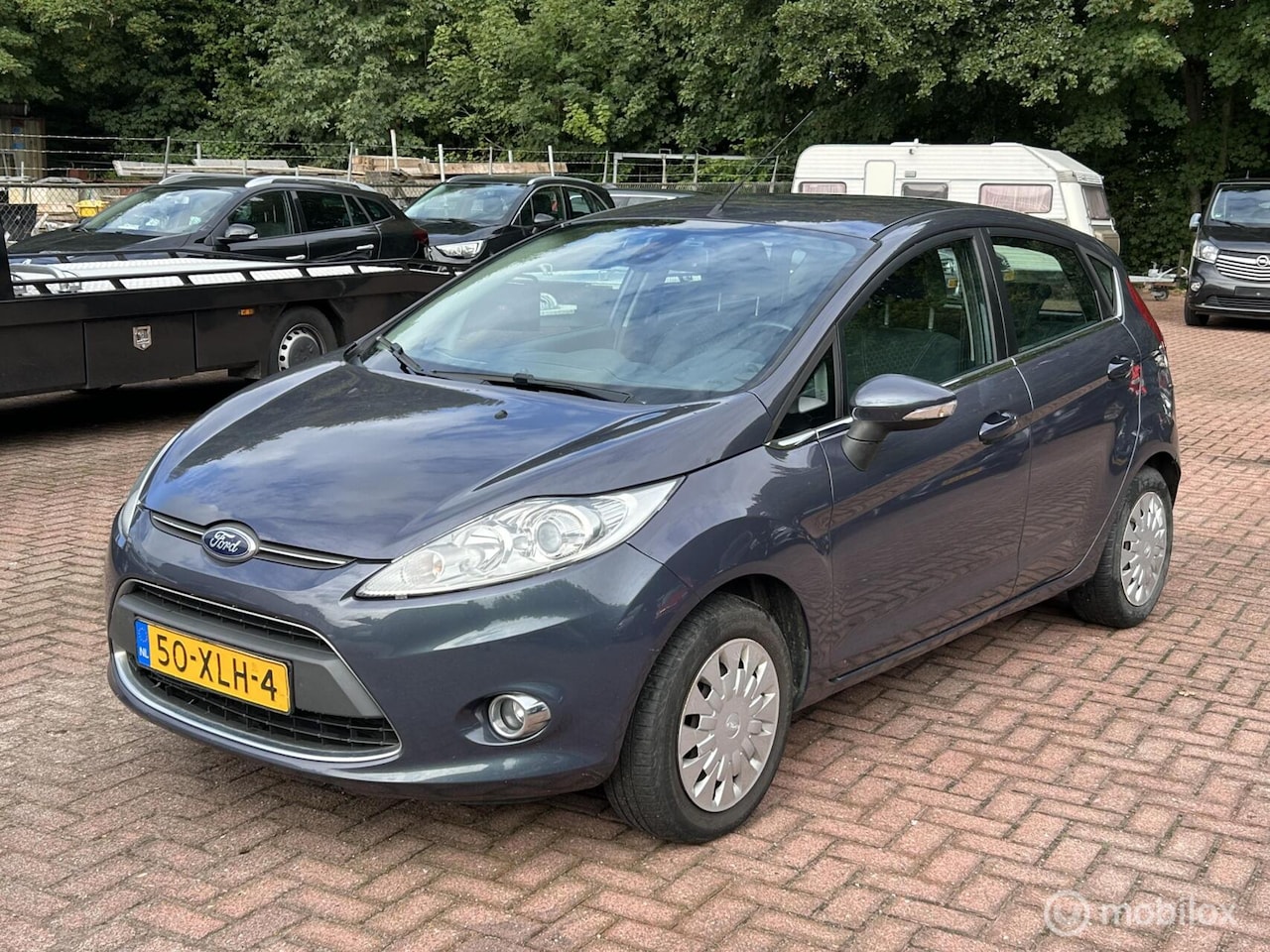 Ford Fiesta - 1.6 TDCi ECOnetic Lease Titanium | Clima | Cruise - AutoWereld.nl