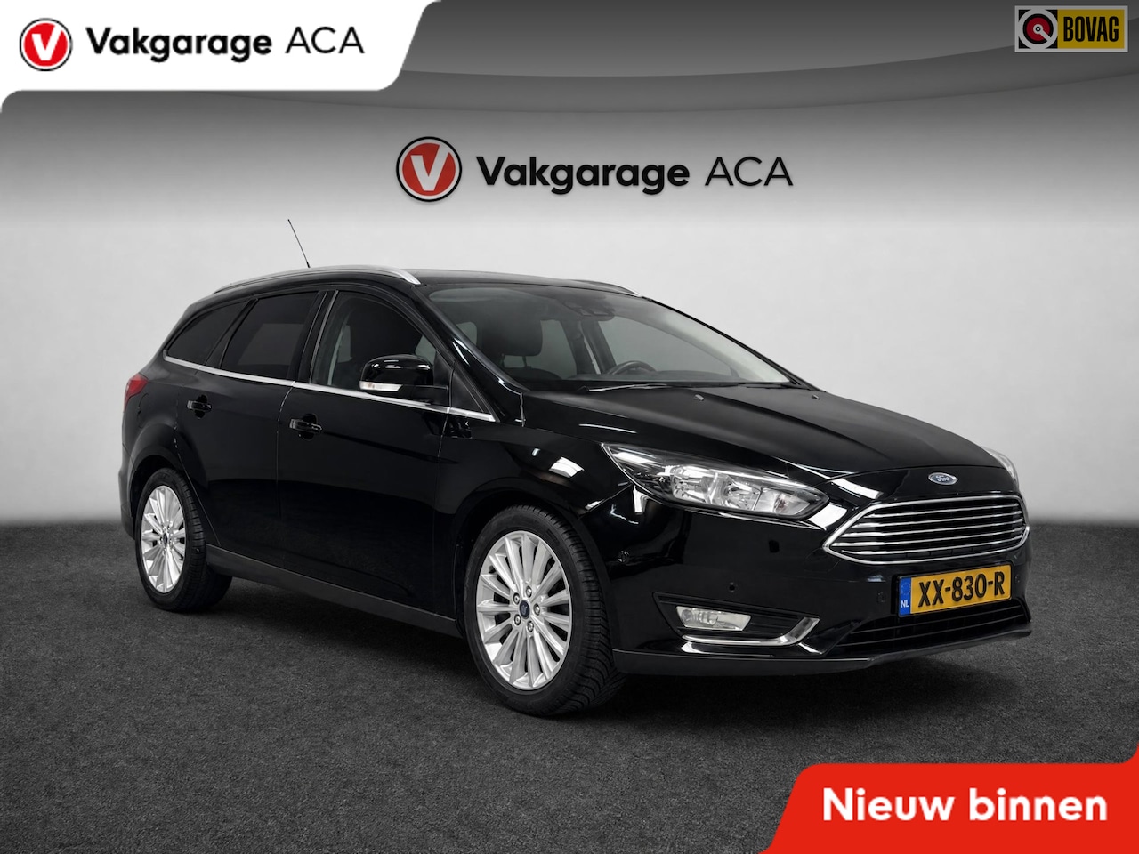 Ford Focus Wagon - 1.0 Titanium // NAVI // STUUR&STOELVERWARMING // TREKHAAK // CAMERA&PDC // CRUISE // - AutoWereld.nl