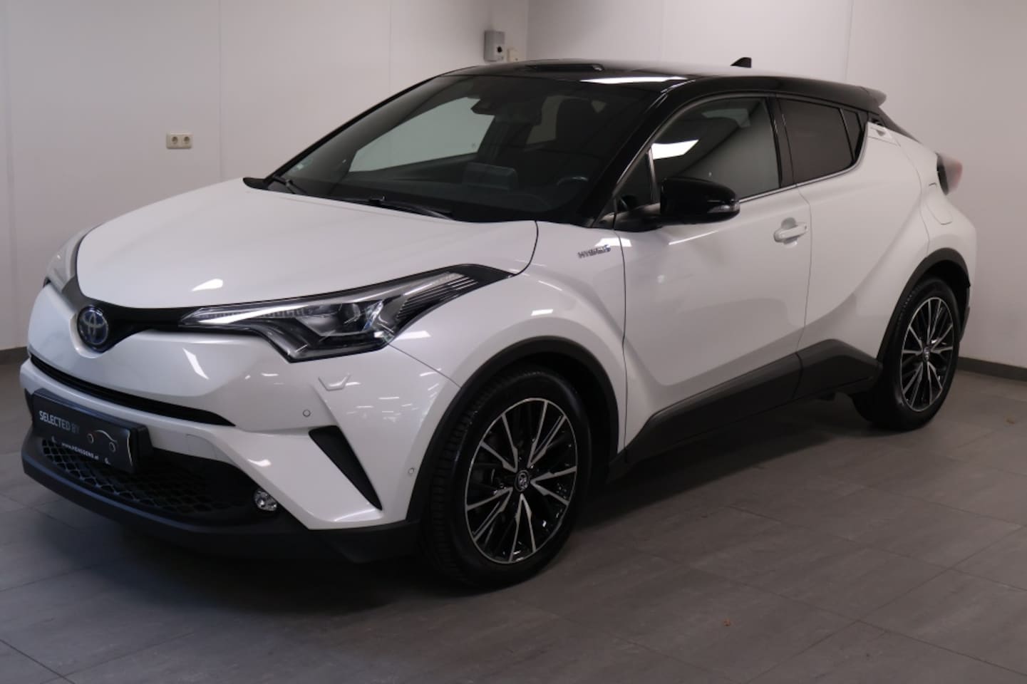 Toyota C-HR - 1.8 Hybrid Bi-Tone 1.8 Hybrid Bi-Tone - AutoWereld.nl