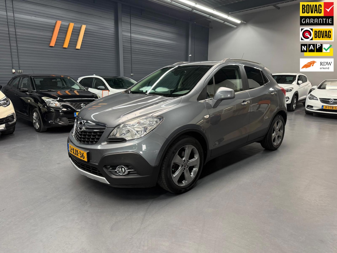 Opel Mokka - 1.4 T Cosmo CAMERA LEDER TREKHAAK NAP NL AUTO - AutoWereld.nl