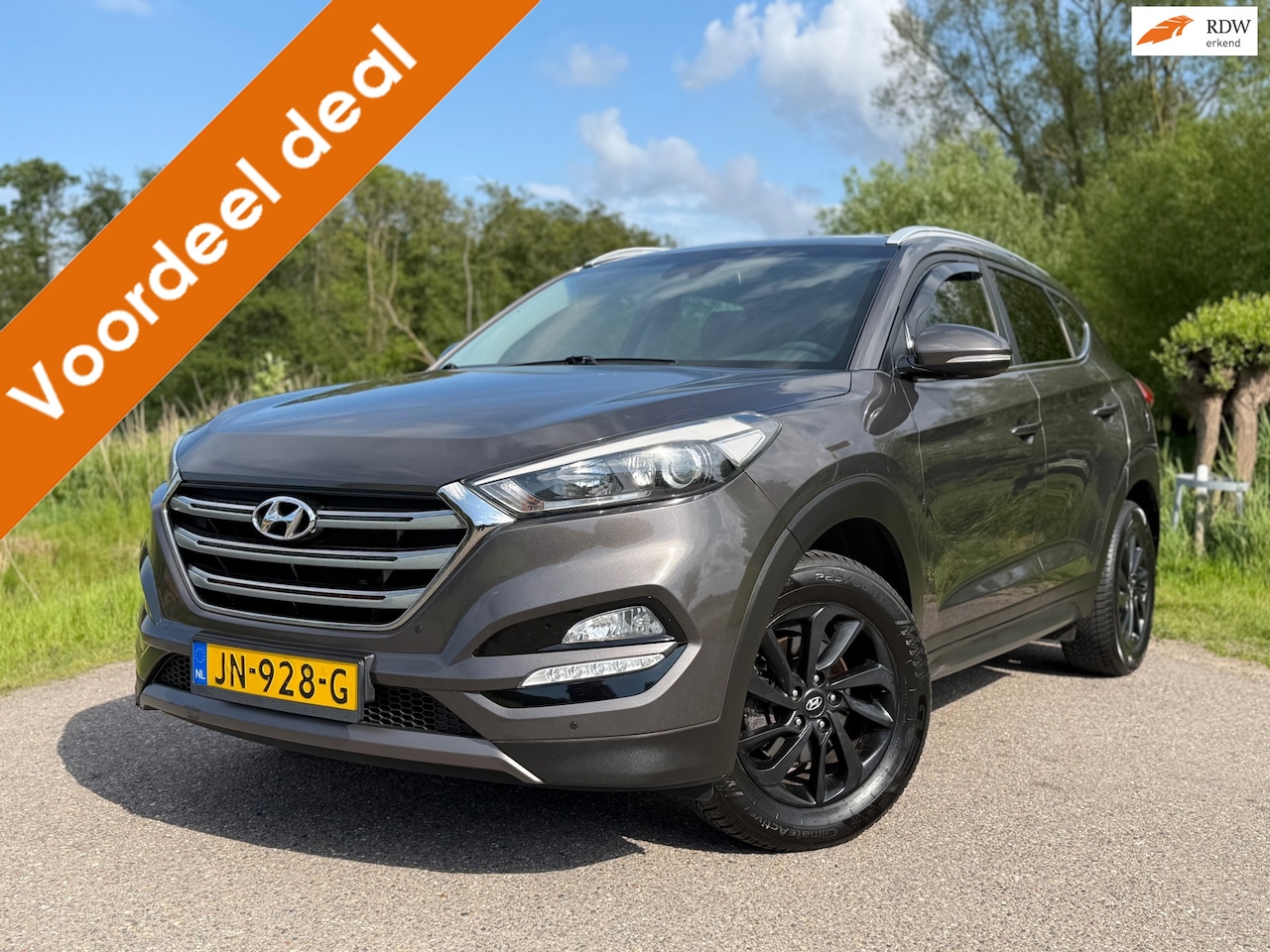 Hyundai Tucson - 1.6 GDi Comfort / Navigatie / Camera / Cruise Control / Climate Control / Stoelverwarming - AutoWereld.nl