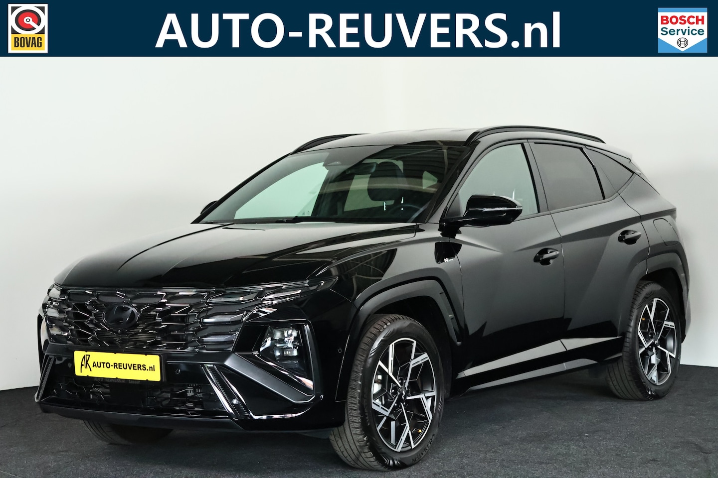 Hyundai Tucson - 1.6 T-GDI PHEV N Line 4WD Navi / ACC / CarPlay / HUD / 360 camera / e stoel - AutoWereld.nl