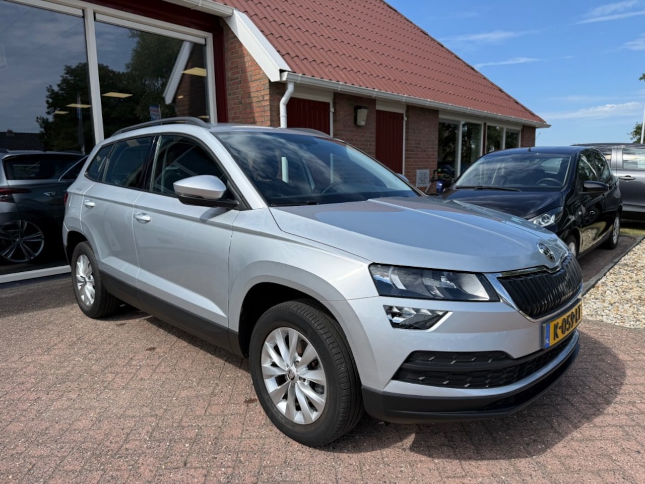 Skoda Karoq - 1.0 TSI AMBITION NAVI/AIRCO/CRUISE CONTROL - AutoWereld.nl