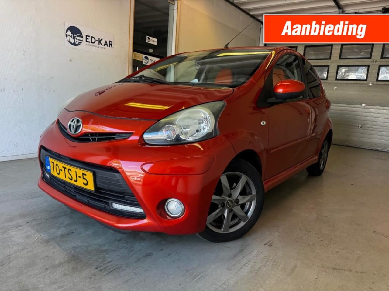 Toyota Aygo - 1.0 VVT-i Dynamic Orange AIRCO 5DRS NAP APK BIJ AFLEVERING - AutoWereld.nl