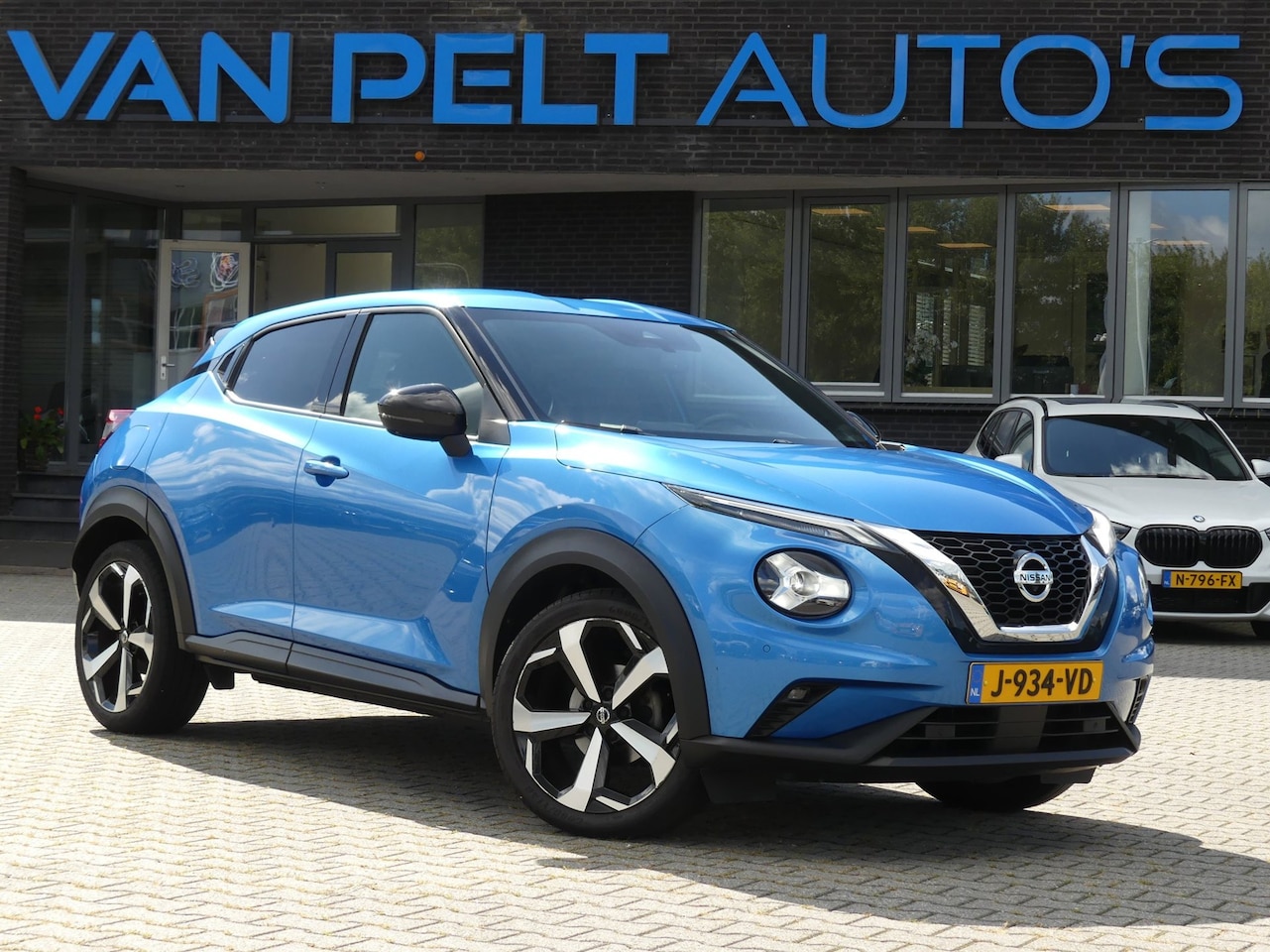 Nissan Juke - 1.0 DIG-T Tekna / BOSE Premium / 19"inch / Stoelverwarming / Navigatie / Sound Pack - AutoWereld.nl