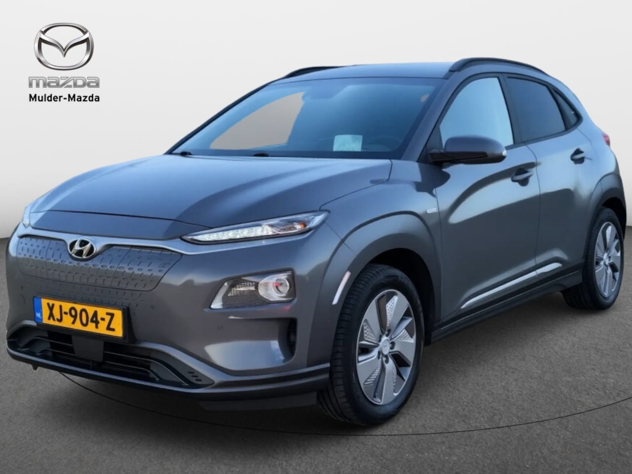 Hyundai Kona Electric - EV Premium 64 kWh | Warmtepomp | Trekhaak | Stoelventilatie | Stoelverwarming - AutoWereld.nl