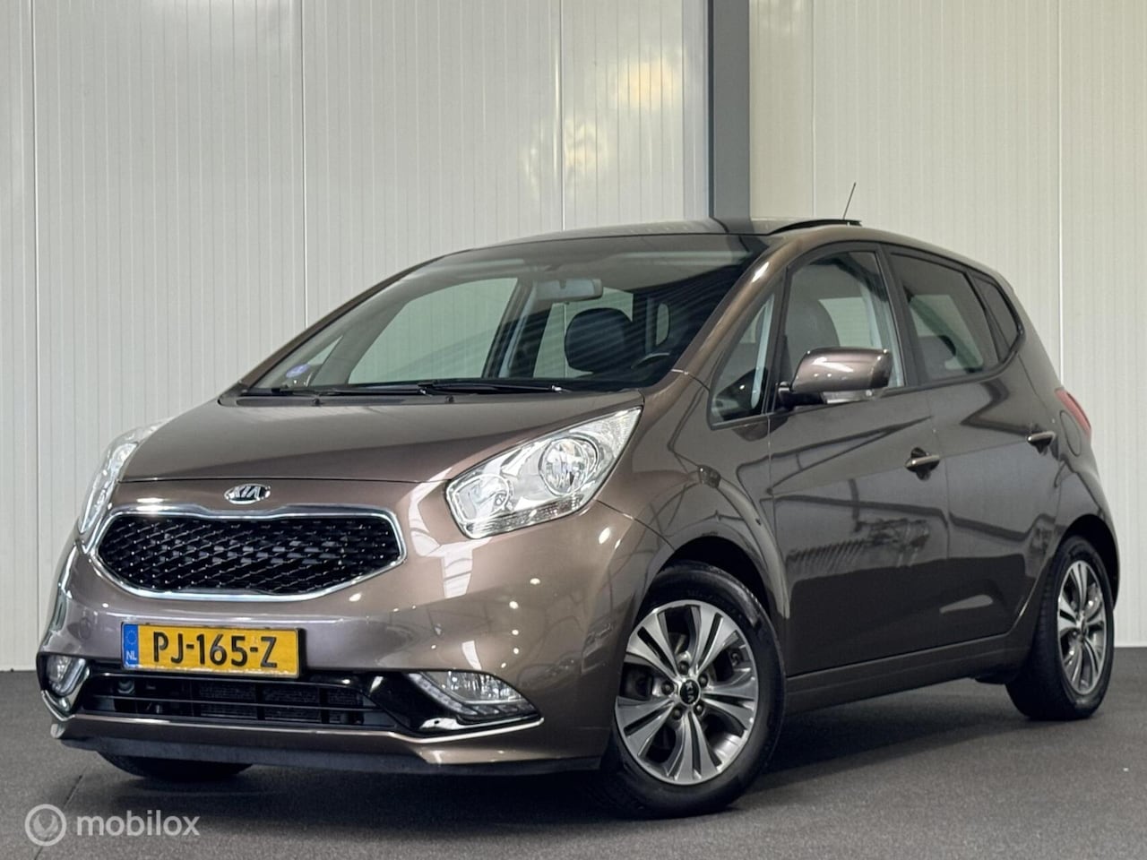 Kia Venga - 1.4 CVVT Summer Edition [ NAP 1e eig. panorama ] - AutoWereld.nl