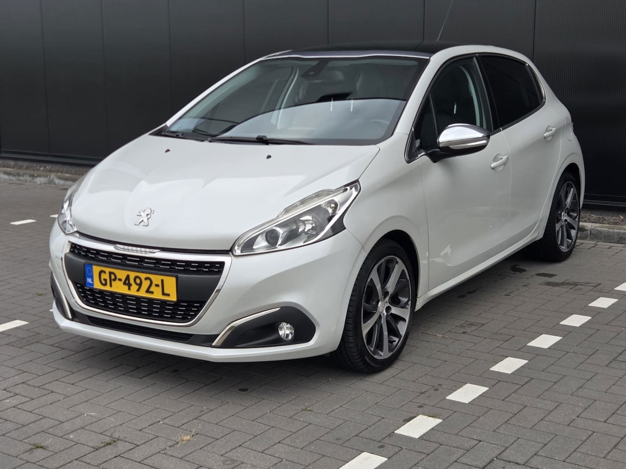Peugeot 208 - 1.2 PureTech Première Automaat - AutoWereld.nl