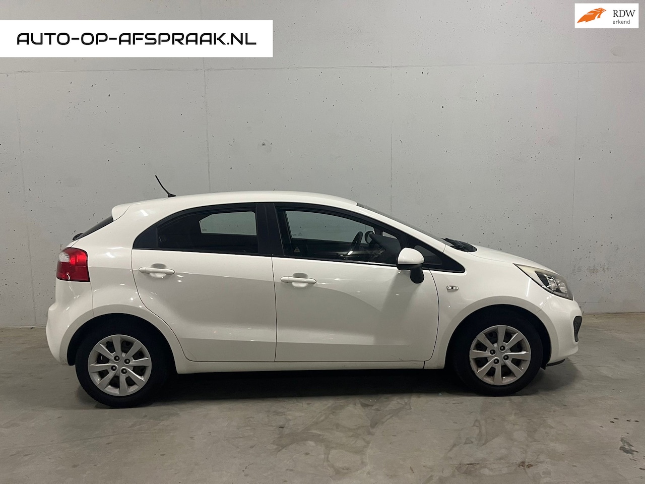 Kia Rio - 1.2 CVVT Comfort Pack 5drs. Airco APK NAP - AutoWereld.nl