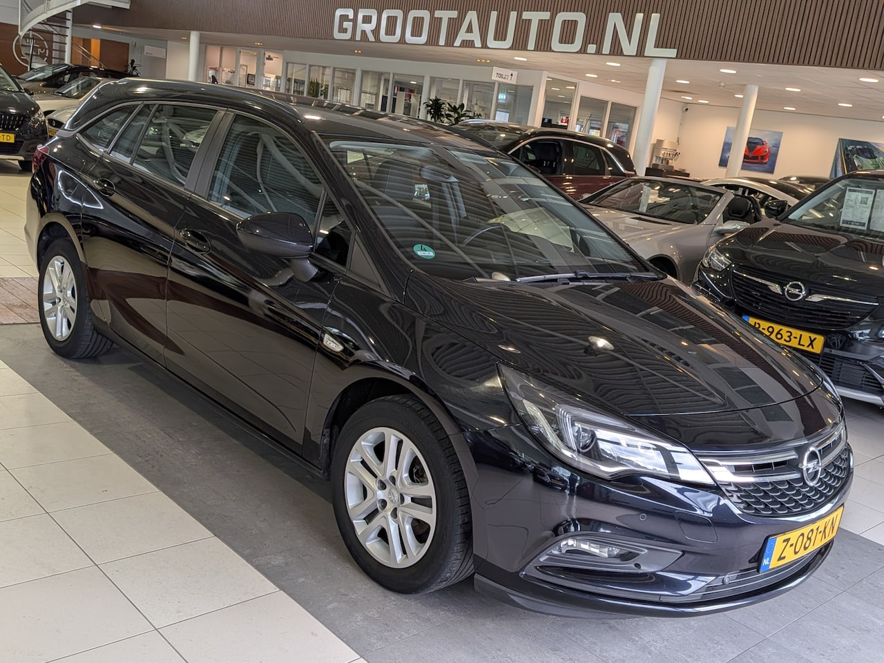 Opel Astra Sports Tourer - 1.0 Turbo Business+ Cruise Control, Carplay, Airco - AutoWereld.nl