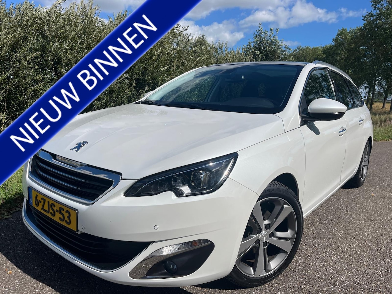 Peugeot 308 SW - 1.2 e-THP Première | Parelmoer wit - AutoWereld.nl