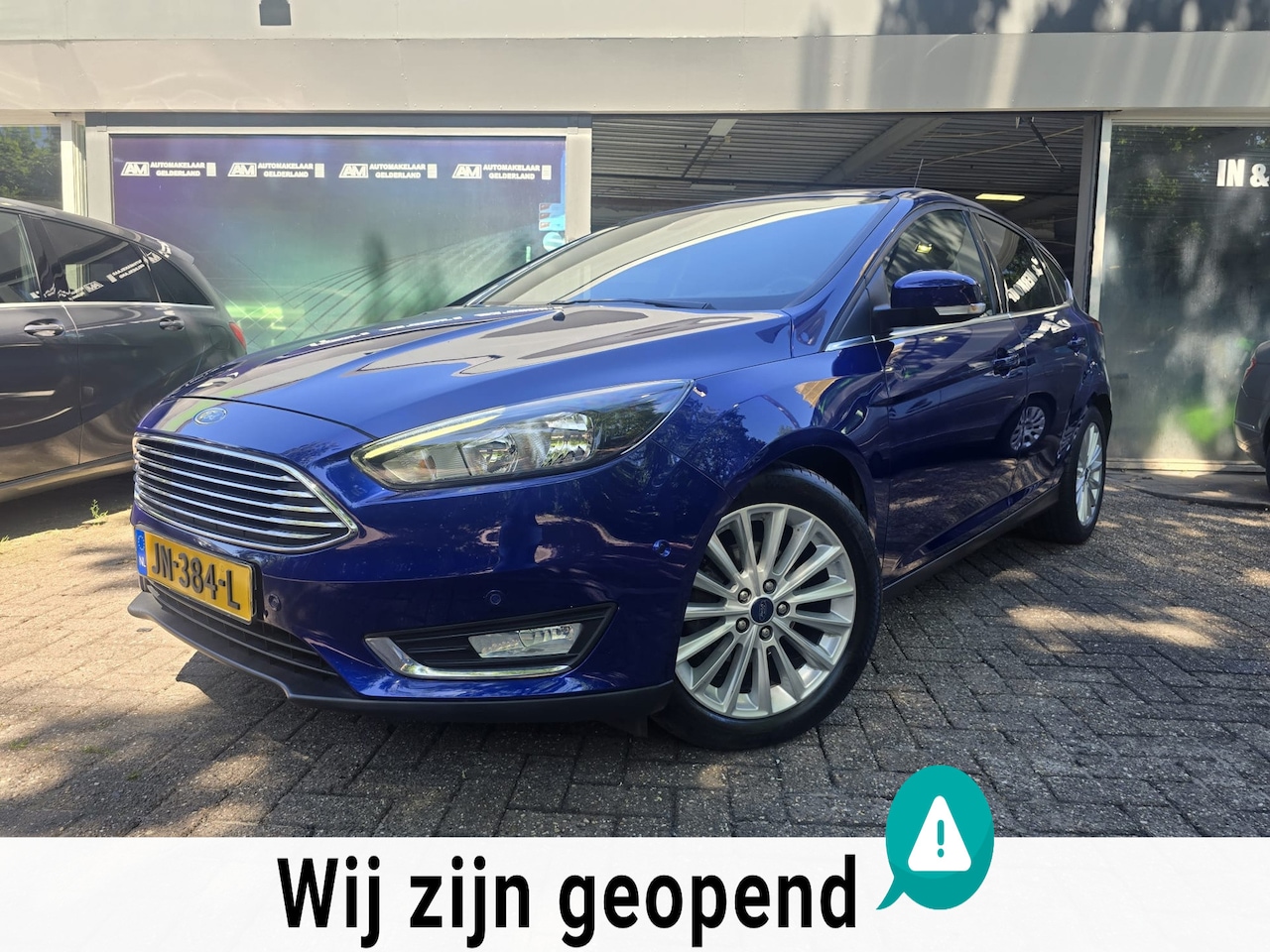 Ford Focus - 1.0 Titanium | 2E EIGENAAR |3/6 OF 12MND GARANTIE | AIRCO | CRUISE | NAVI | LMV | - AutoWereld.nl