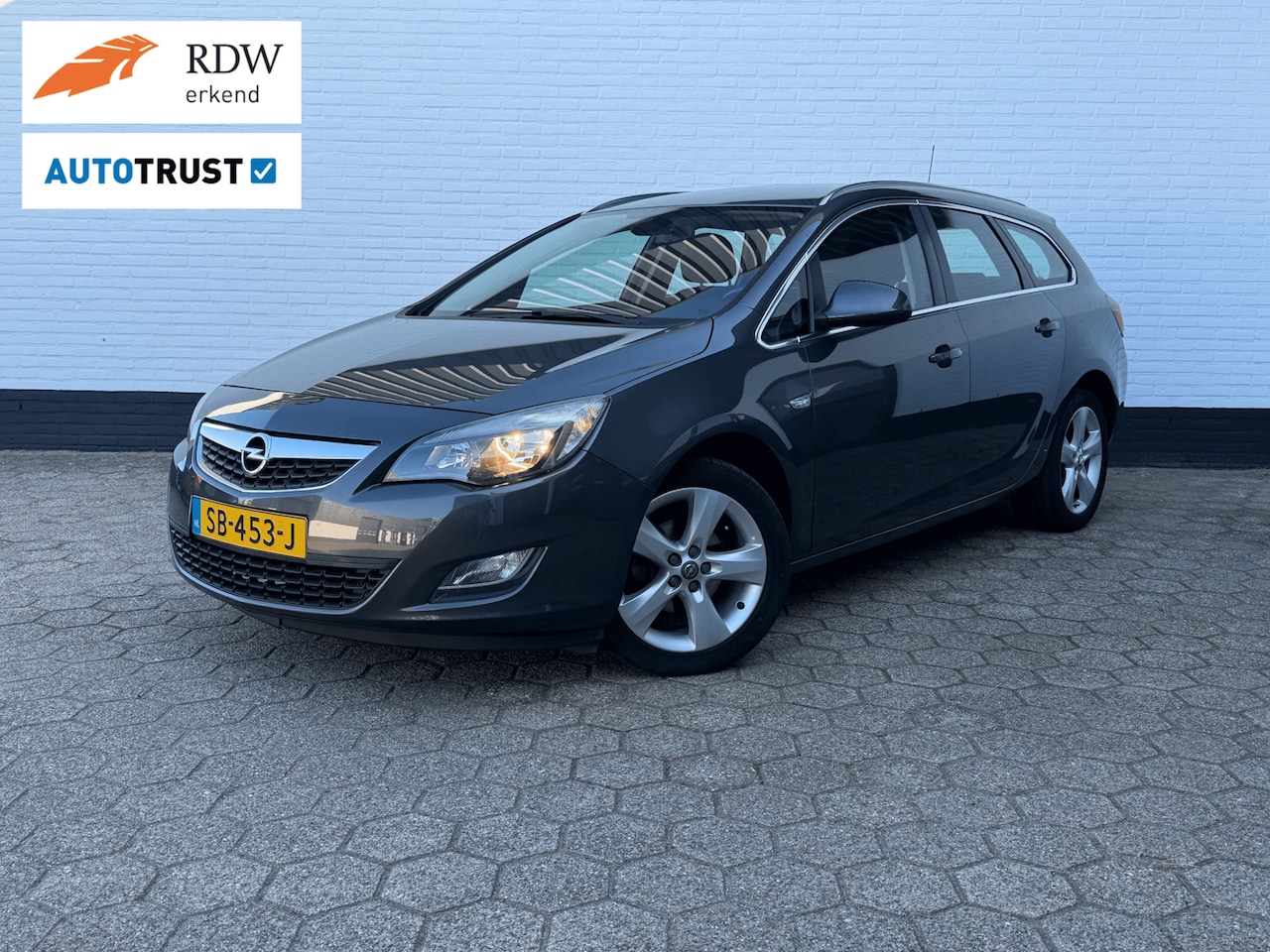 Opel Astra Sports Tourer - 1.4 Turbo Sport l CRUISE l TREKHAAK! - AutoWereld.nl