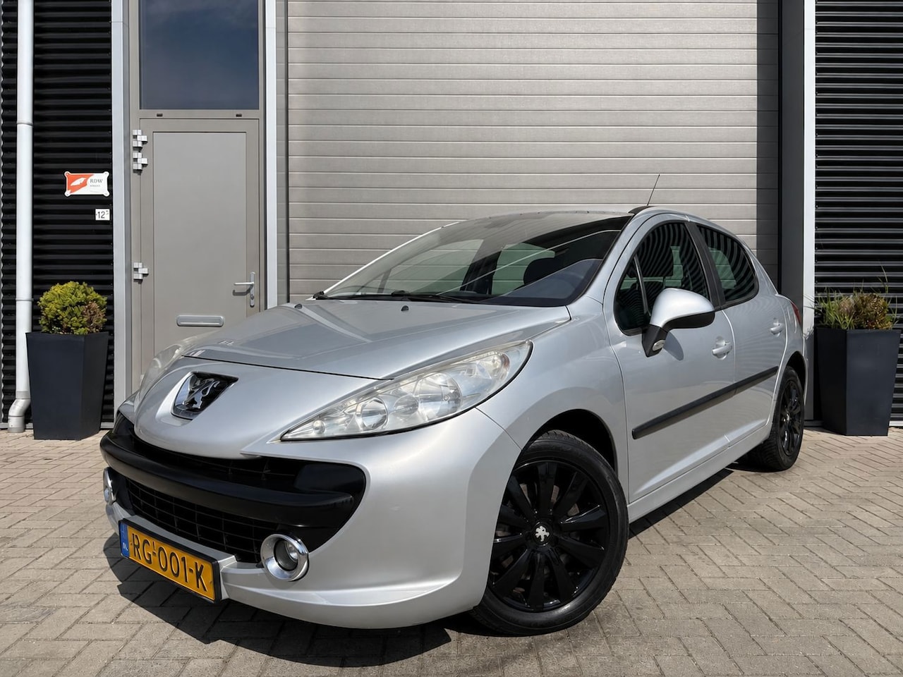 Peugeot 207 - 1.4-16V XR/130.000/Vol jaar APK/Airco/Carplay - AutoWereld.nl