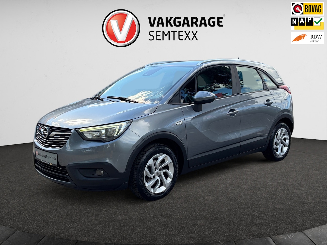 Opel Crossland X - 1.2 Online Edition | Airco | Cruise | PDC Achterzijde | Navi | Distr. Verv. 10-2023 bij 73 - AutoWereld.nl