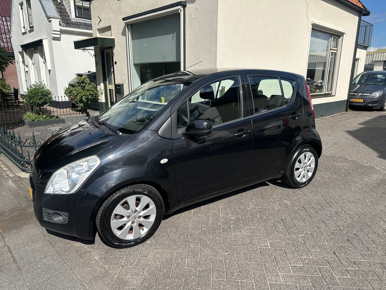 Suzuki Splash - Auto heeft wat schade aan achterbumper voor portier en voor scherm - AutoWereld.nl