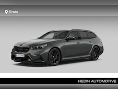 BMW 5-serie Touring - M5 | Akrapovic trapezium uitlaat | M Drive Professional | M Carbon keramische rem | Trekha