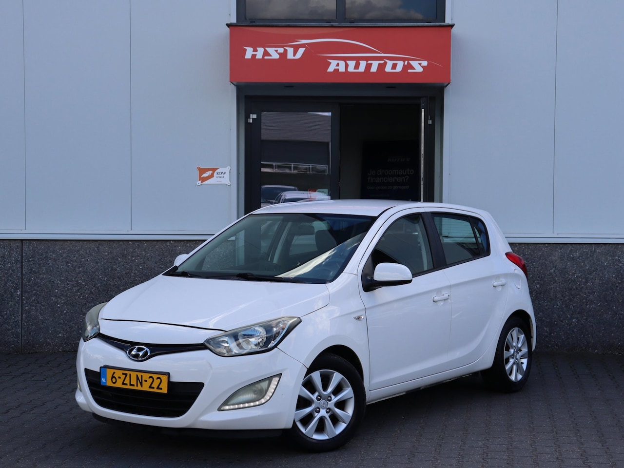 Hyundai i20 - 1.2i Business Edition airco LM 4-deurs *97.000km* - AutoWereld.nl