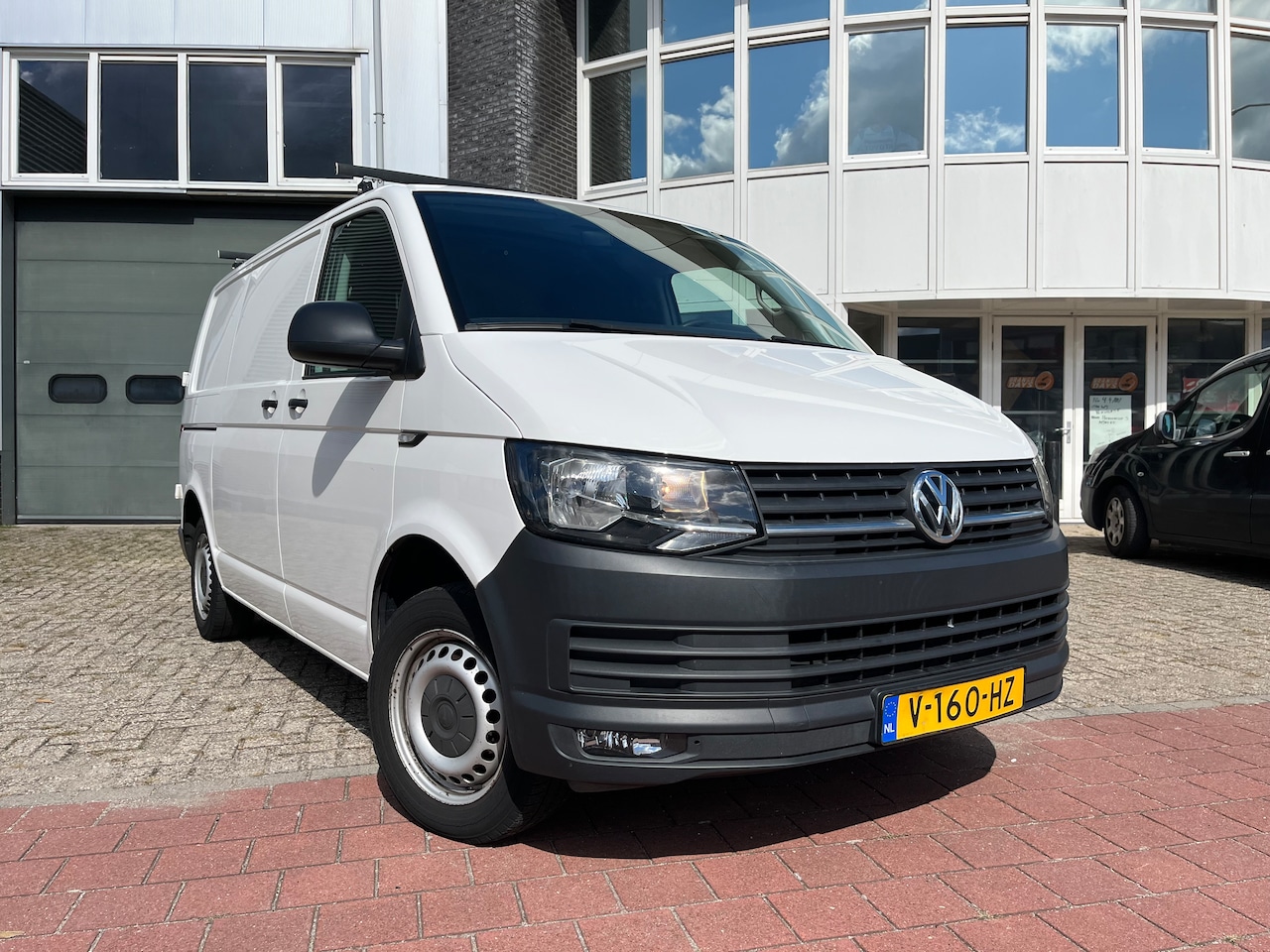 Volkswagen Transporter - 2.0 TDI L1H2 Comfortline - AutoWereld.nl