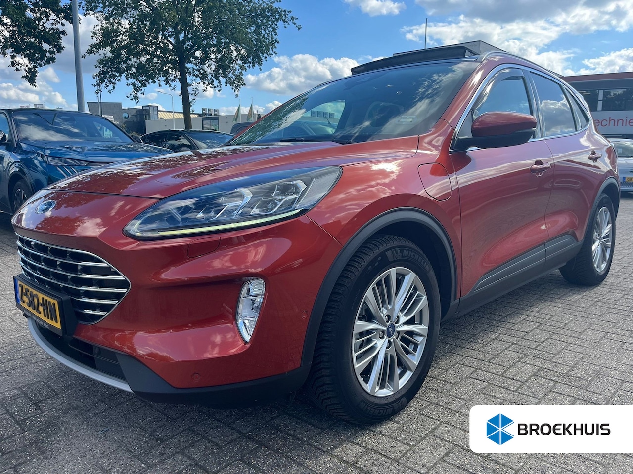 Ford Kuga - 2.5 PHEV ST-Line X | Panorama schuif-/kanteldak | Voorstoelen verwarmd | Stuurwiel verwarm - AutoWereld.nl