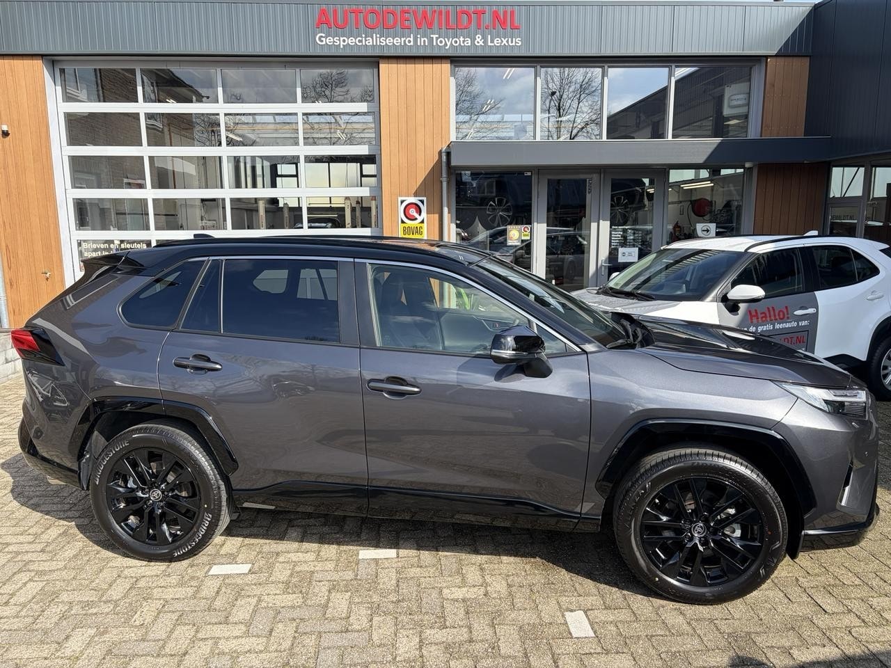 Toyota RAV4 - 2.5 Hybrid 220 Style Bi-tone A/T - AutoWereld.nl