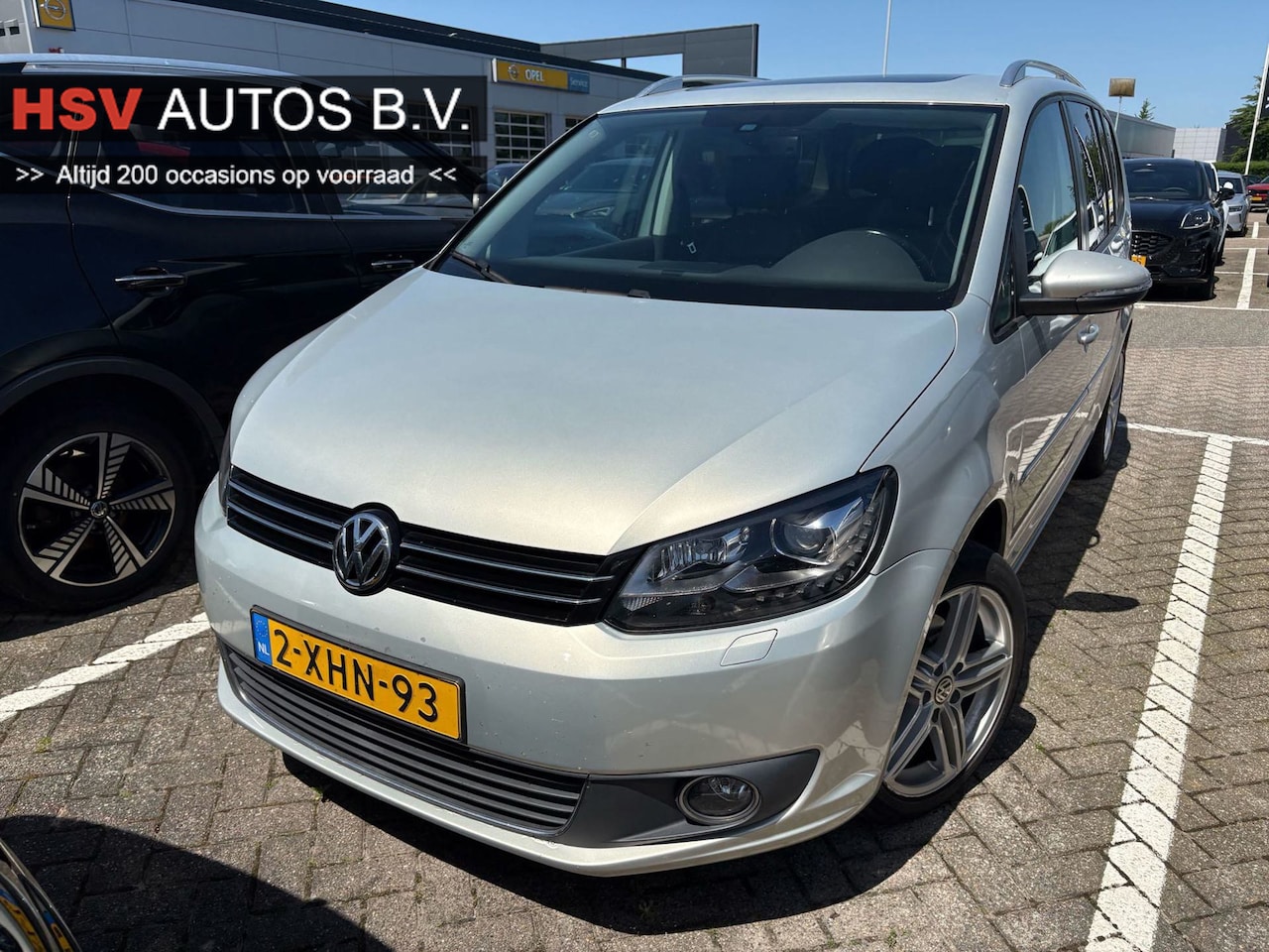 Volkswagen Touran - 1.2 TSI Highline BlueMotion 7-pers navi LEER org NL - AutoWereld.nl