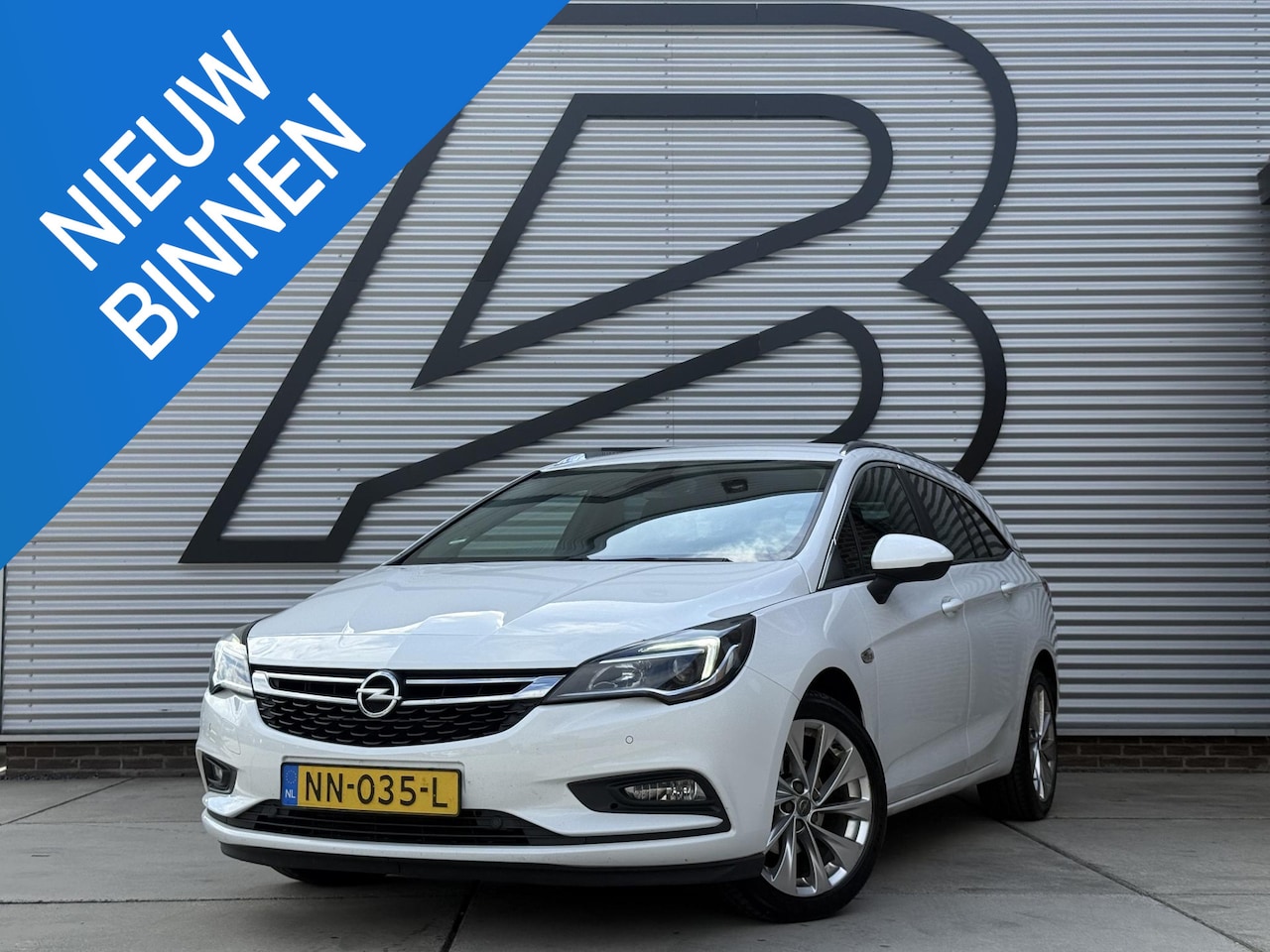 Opel Astra Sports Tourer - 1.4 Online Edition 2e Eigenaar|Navi|Camera|Clima|Cruise|Trekhaak|PDC|Carplay|N.A.P|APK tot - AutoWereld.nl
