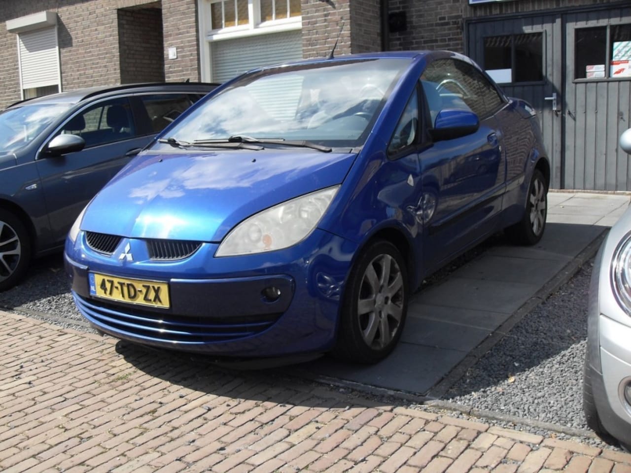 Mitsubishi Colt CZC - 1.5 Invite CZC Cabrio - AutoWereld.nl
