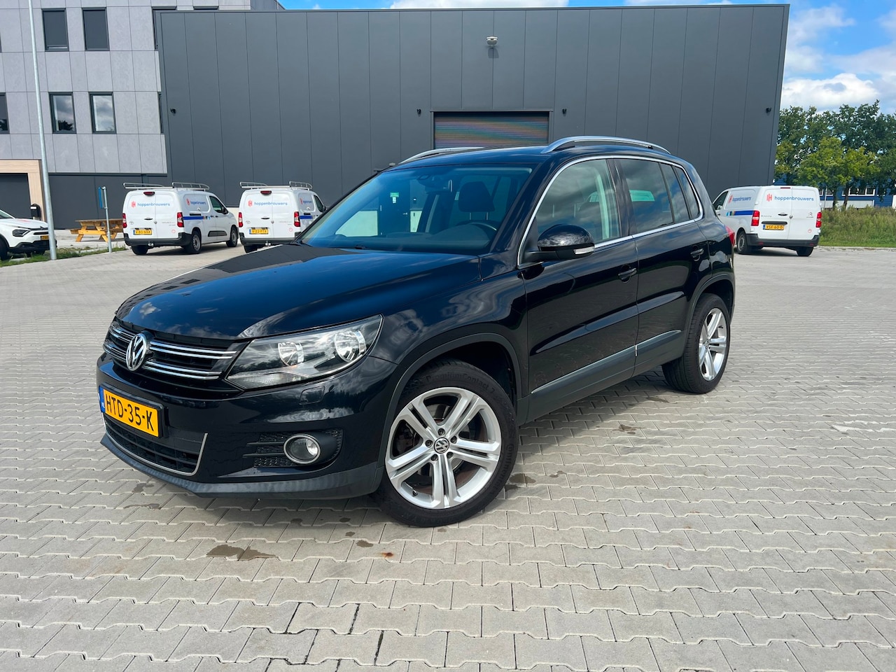 Volkswagen Tiguan - 1.4 TSI Sport&Style Trekhaak|Stoelverwarming - AutoWereld.nl
